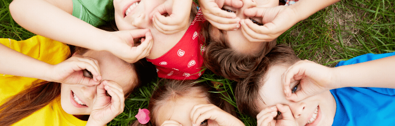 close up of children's smiling faces